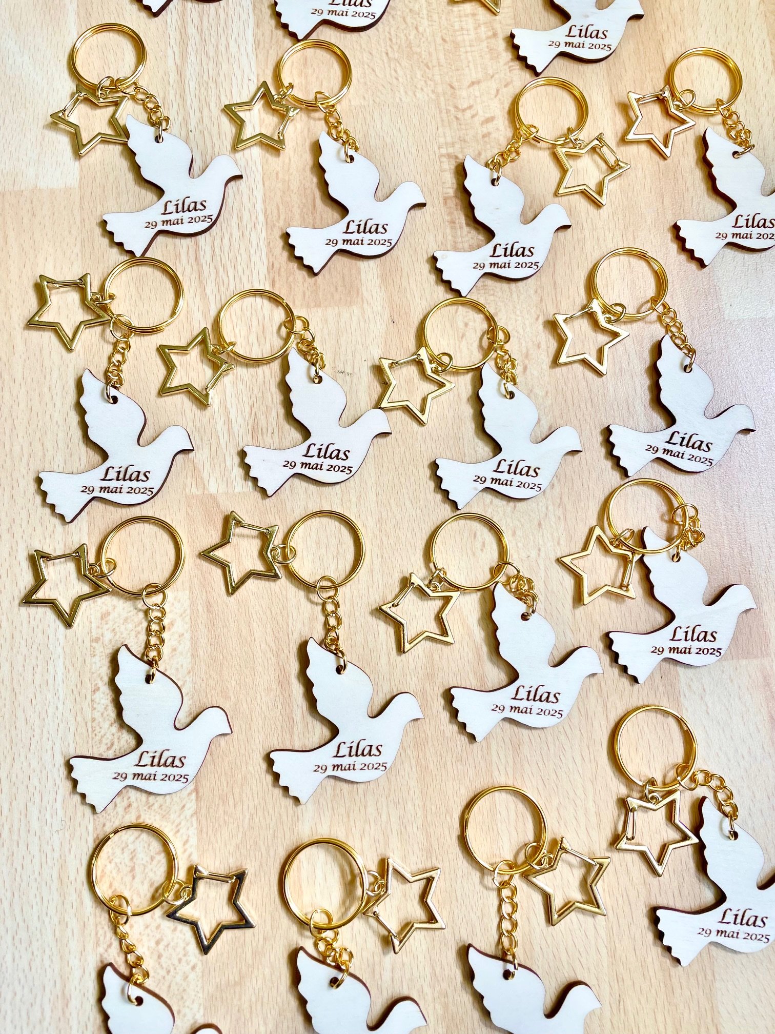 Porte clé colombe étoile doré