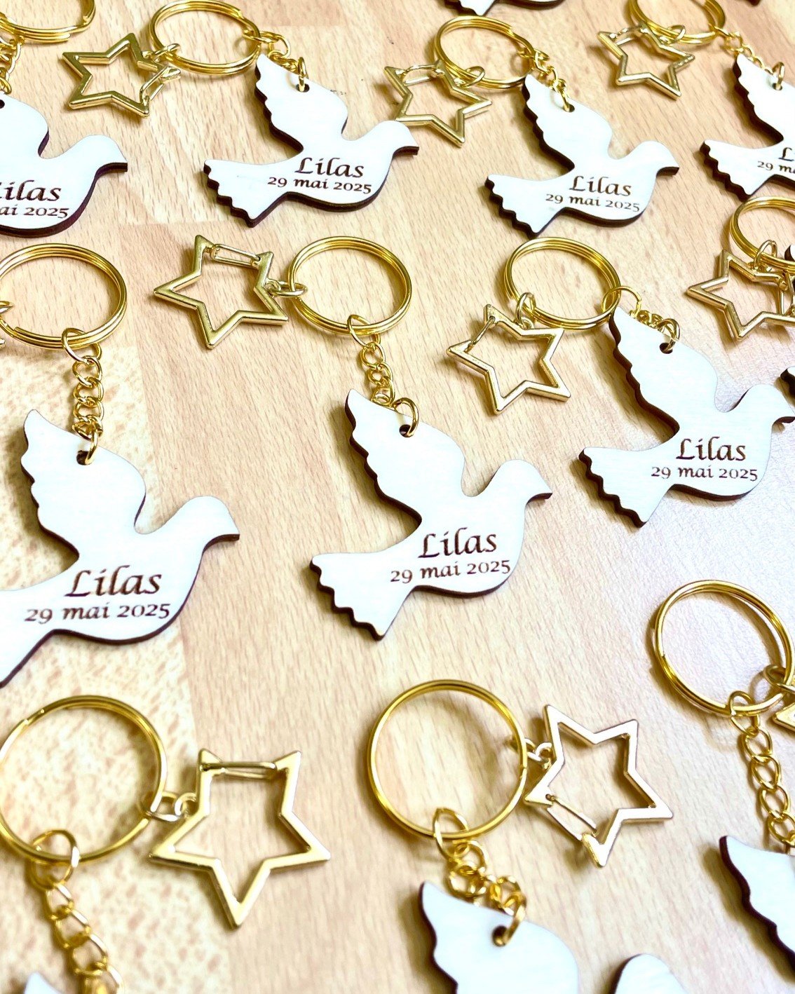Porte clé colombe étoile doré