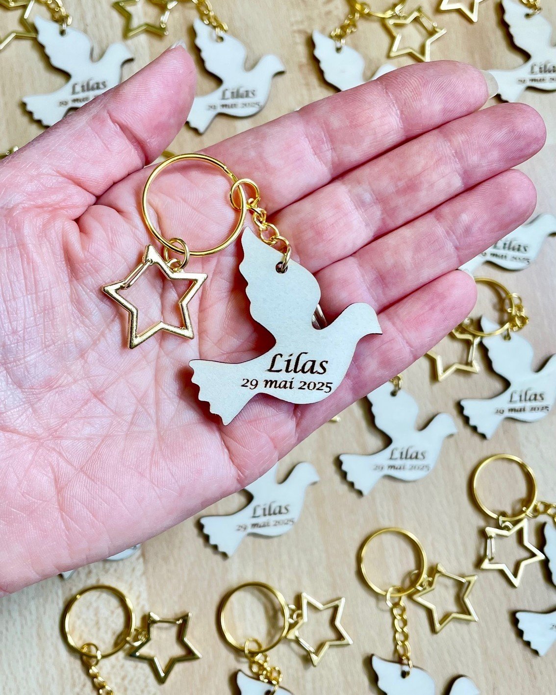 Porte clé colombe étoile doré